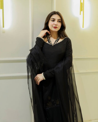 Elegance in Black: A Captivating Pose of Timeless Beauty