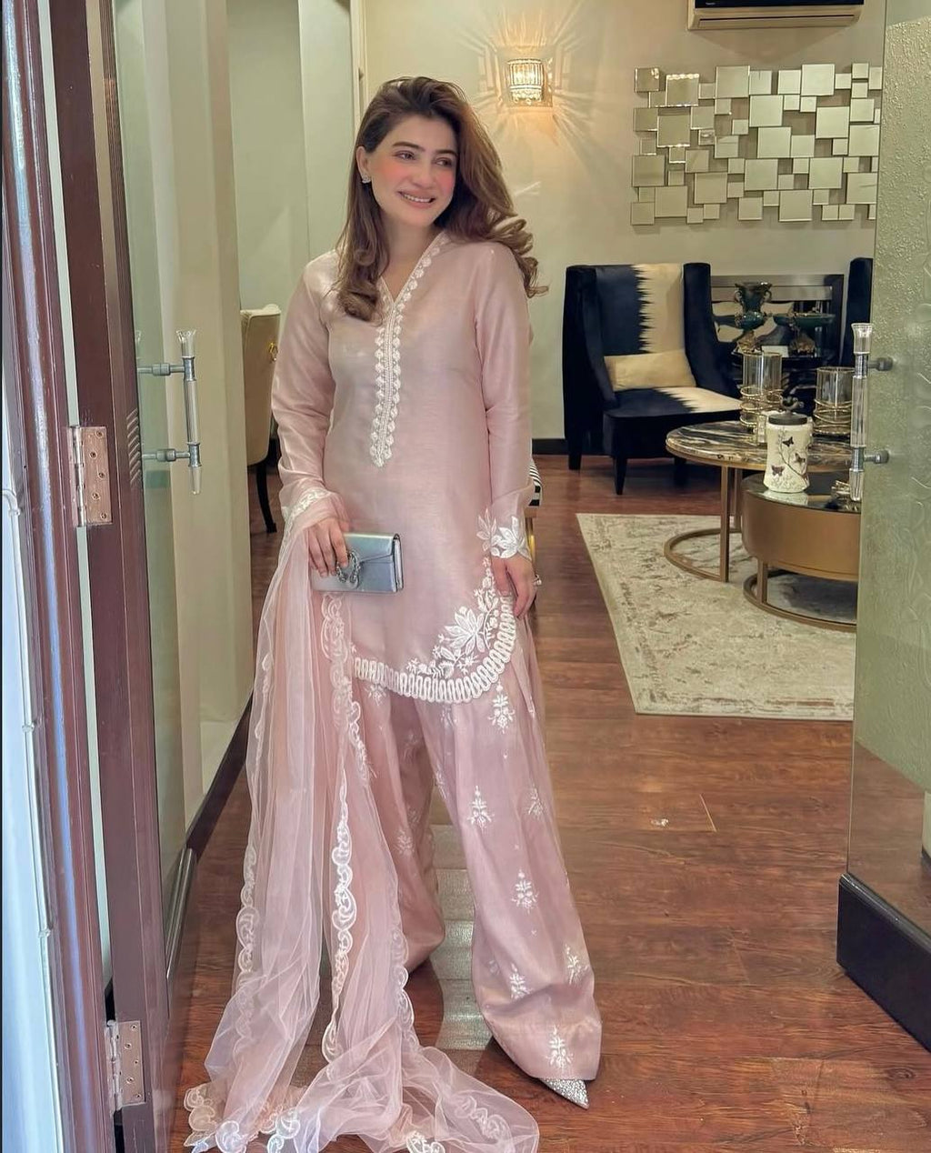 Chic Confidence: Embracing Style and Grace in a Striking Pink Ensemble