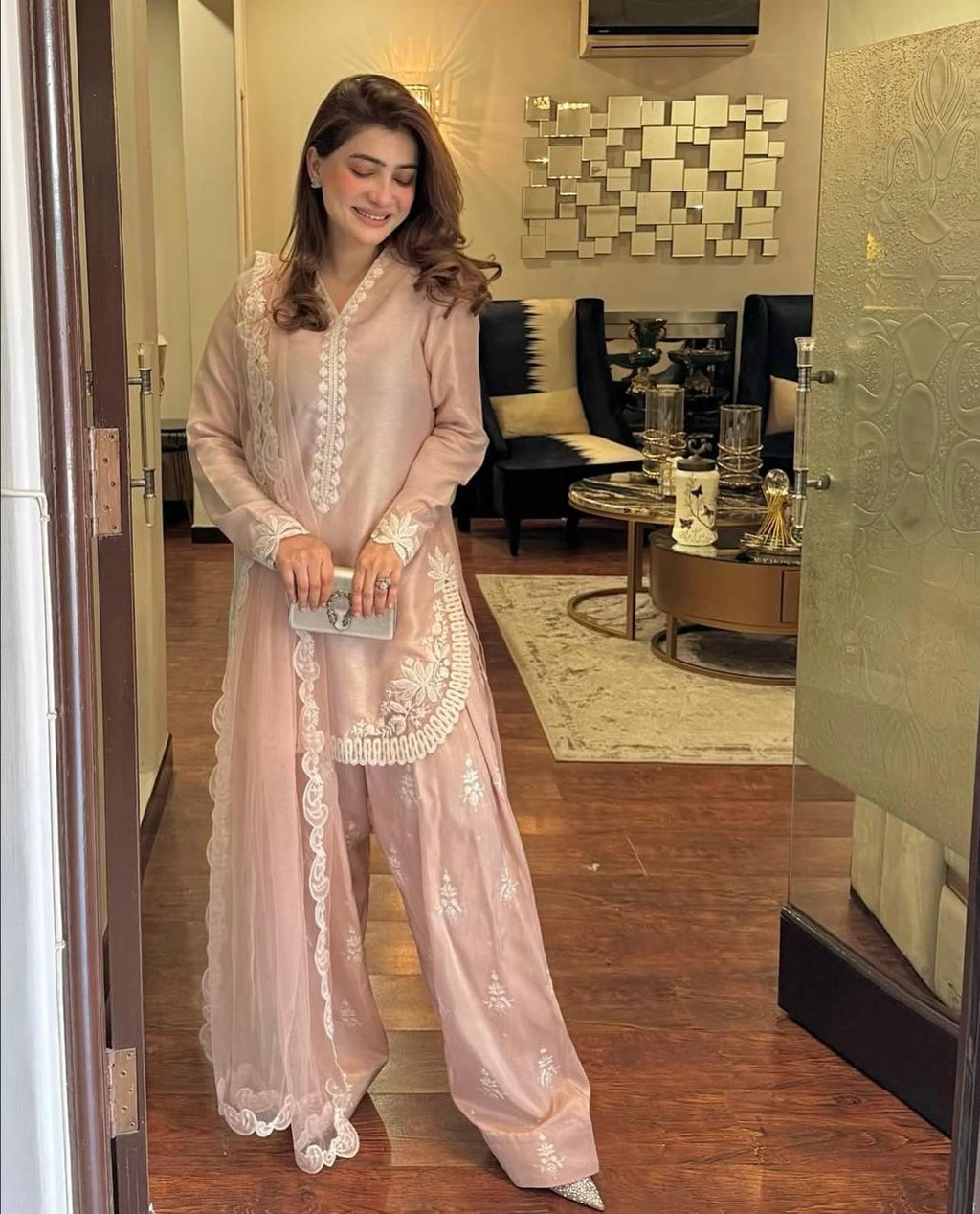 Chic Confidence: Embracing Style and Grace in a Striking Pink Ensemble
