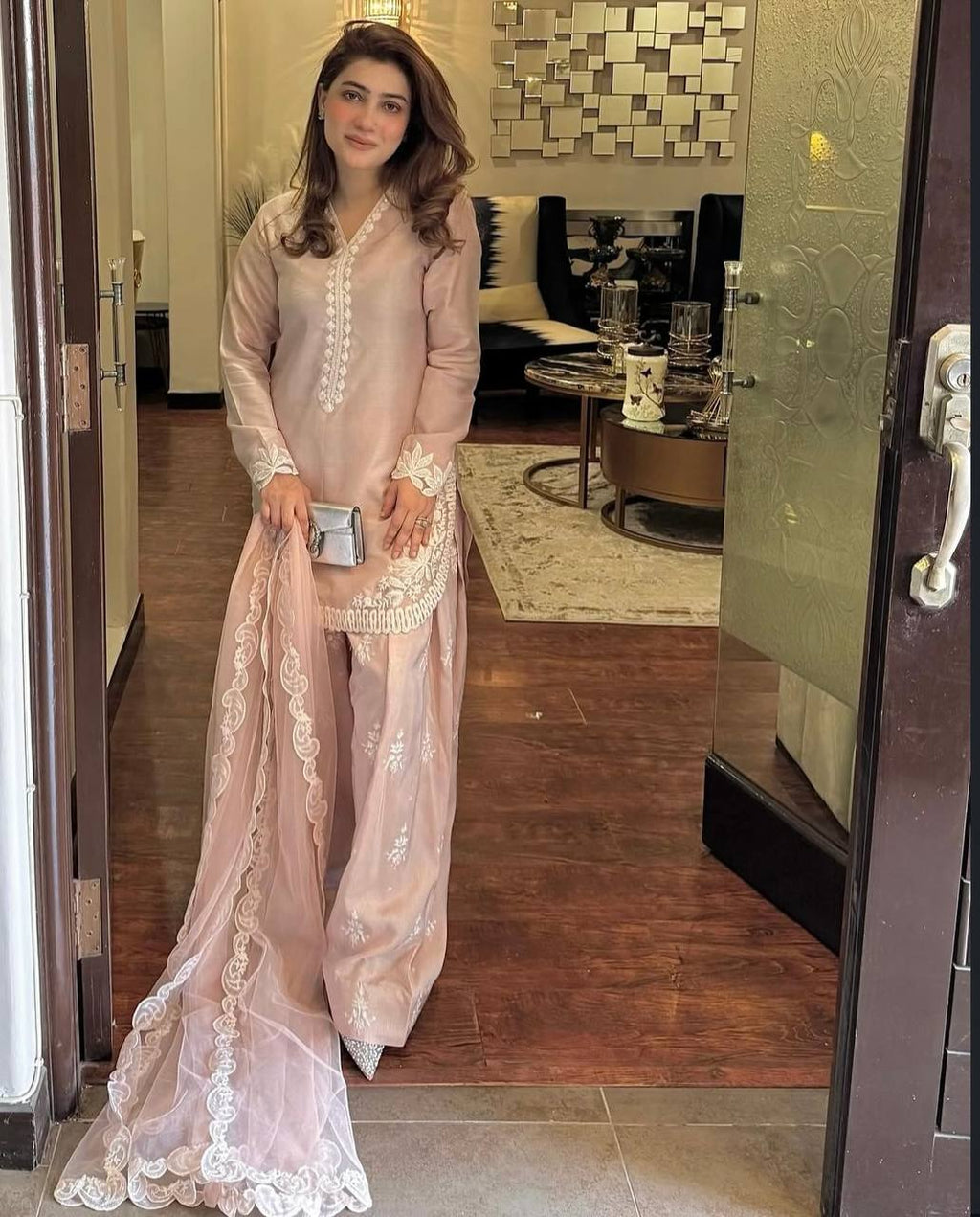 Chic Confidence: Embracing Style and Grace in a Striking Pink Ensemble