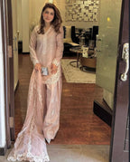 Chic Confidence: Embracing Style and Grace in a Striking Pink Ensemble
