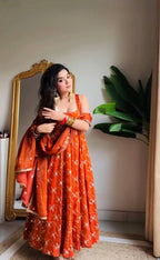 Radiant Elegance: A Vision in Orange Glamour