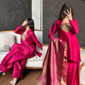 A Vision of Confidence in a Stylish Pink Suit