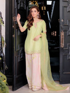 Serene Beauty: A Young Muse Adorned in Lush Green