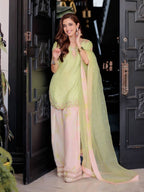 Serene Beauty: A Young Muse Adorned in Lush Green