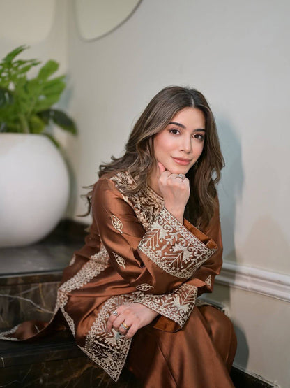 legance in Earth Tones: A Serene Moment on the Steps